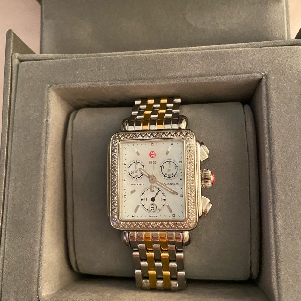 Michelle Deco diamond dial and bezel ladies watch.